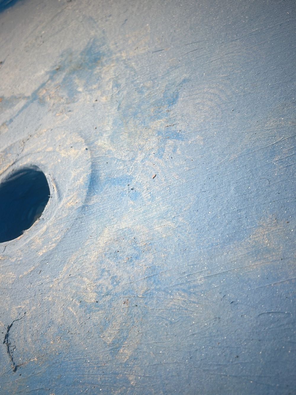 Puddle flange standing proud of the shower floor, so water cannot drain into it, found during a fixing inspection in Gables